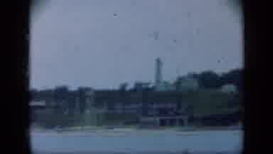 Long Island New York (1948): View Of Lighthouse At Canal Entrance To Small Marina