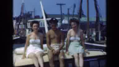 Long Island New York (1948): Two Brunette Women And A Tanned Man Sitting On A