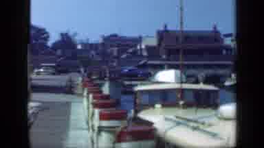 Long Island New York (1948): Women Sit On The Boat That Is Tied To The Dock And