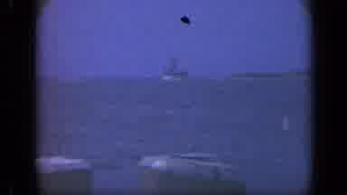 Long Island New York (1948): View Of A Large Vessel Off Of An Ocean Coast At Night