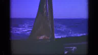 Long Island New York (1948): Boat Sailing Down A Blue Lake With A Waving American