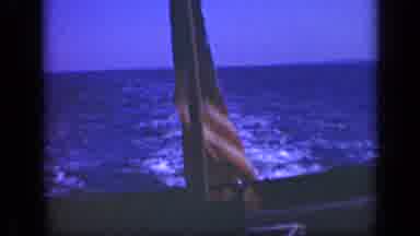 Long Island New York (1948): Flag Behind A Boat That Is Being Driven By An Ocean