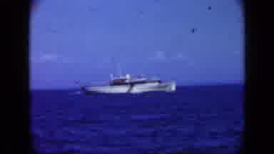 Long Island New York (1948): A Ship Is Sailing Across The Sea While Another One Is