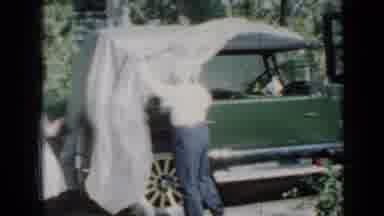 Minnesota USA (1958): Pop Unveils His Vintage Auto With Aid Of Daughter And