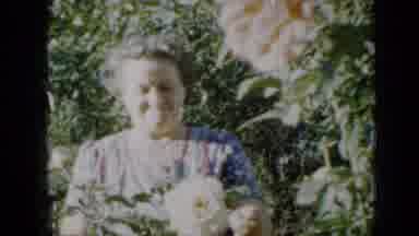 Minnesota USA (1958): Lady Enjoying The Garden