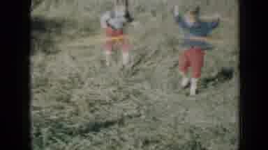 Minnesota USA (1958): Two Small Children Practice With The Hula Hoop