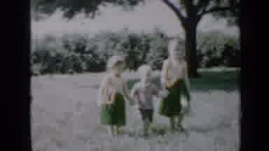 Minnesota USA (1958): Two Young Girls Hula Dancing And Walking With Little Boy