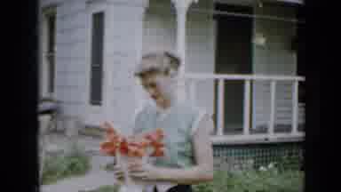 Minnesota USA (1958): Video Of A Man Standing Then A Woman Holding Flowers And