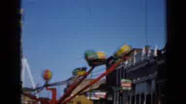 Minnesota USA (1958): Several Amusement Rides Are Set Up In The Street But Are