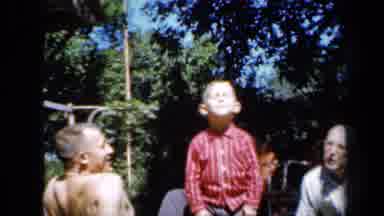 Minnesota USA (1958): Three Generations Spending Quality Family Time Together And