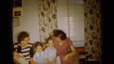 Minnesota USA-1958: Family Posing For A Photo On Couch