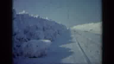 Minnesota USA (1958): Deserted Street Covered With Snow And Snow Drifts On Both