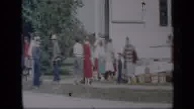 Aledo Texas (1959): A Group Of People Standing In The Yard Of A Church While