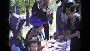 Aledo Texas (1959): Women With Large Hats Sitting By A Table Then Kid Waving Flag