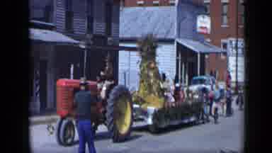 Aledo Texas (1959): Children Follow Float Pulled By Red Tractor Then Blue Car