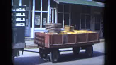 Aledo Texas (1959): Truck Trailer Dragging Rummage While Small Blue Truck Follows