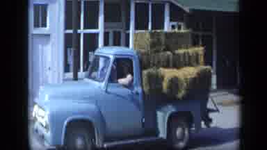 Aledo Texas (1959): Farmers Hauling Loads Of Straw And Vegetables Past Buildings