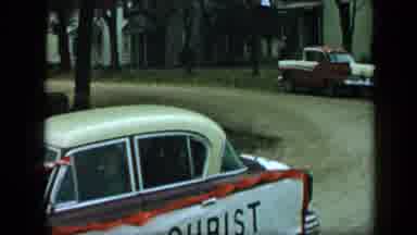 Aledo Texas (1959): Multiple Colored Car Drives By With The Word Christ On It And