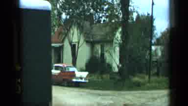 Aledo Texas (1959): Full Truck Is Driving Down The Street