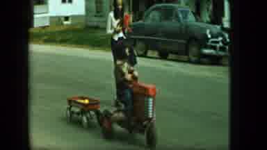 Aledo Texas (1959): People Riding Bikes And Horses And A Child Pulling A Wagon