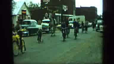 Aledo Texas (1959): Stragglers Come Down The Street After The Body Of The Parade