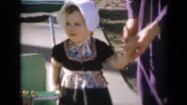 Iowa USA (1959): Little Girl Looks Right To See Beautifully Decorated Float With A