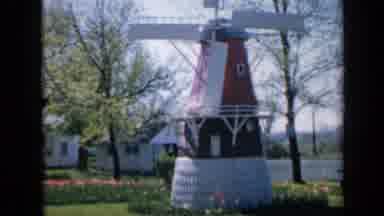 Iowa USA (1959): Small Windmill On Well Kept Grass And Flowers
