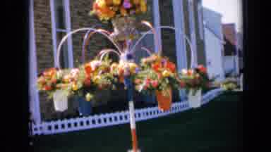 Iowa USA (1959): Front Yard Garden With Orange Flowers In A Wheelbarrow And
