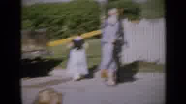 Iowa USA (1959): Family Gathers Outside For Event Which Requires White Clog Shoes