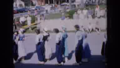 IOWA USA-1959: Women in Traditional Costumes Perform Line Dance
