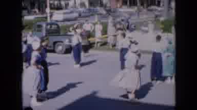 Iowa USA (1959): Country Dance In Center Of Town Wearing Traditional Folk Attire