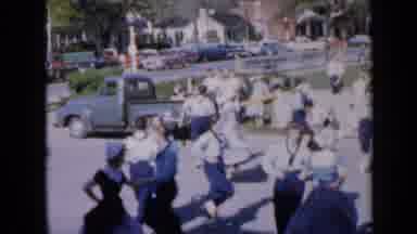 Iowa USA (1959): Group Of People Wearing Traditional Clothing Square-Dancing In A
