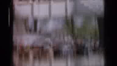 Iowa USA (1959): People In A Circle Going Around One Guy Standing In The Middle