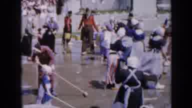 Iowa USA (1959): Women And Girls In Long Dresses And Bonnets Scrub A Wet Outdoor