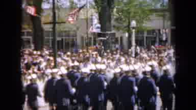 Iowa USA (1959): Marching Military Men Go Through Drill During Parade Down Street