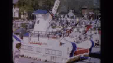 Iowa USA (1959): Sailors Moves There Float Through A Busy Parade Road