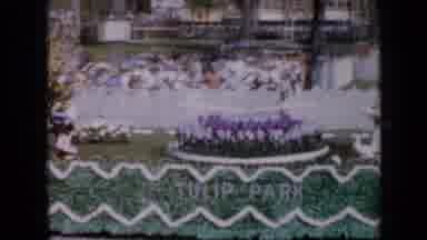 Iowa USA (1959): Green Float Full Of Flowers Passing On The Street In A Parade