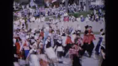 Iowa USA (1959): Costumed Group Of People Walk In A Parade Women Wearing Bonnets