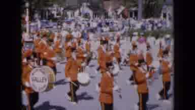 Iowa USA (1959): Music Presentation With Drums And People Dressed In Orange