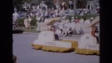 Iowa USA (1959): A Small Float And Baton Twirlers Leading In A Marching Band