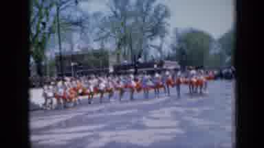 Iowa USA (1959): Cheerleaders Dancing In Unison In Event As People Watch