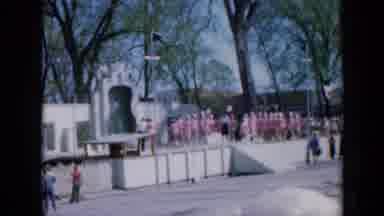IOWA USA-1959: A Group Of Young Women In Pink Perform Synchronized Skipping On A Park Stage