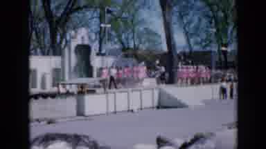 Iowa USA (1959): A Crowd Of Girls On A White Stage Dressed In Pink Jumping Rope In