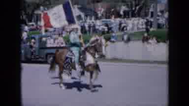 Iowa USA (1959): Men Parading With Their Horses Wielding National States Flags On