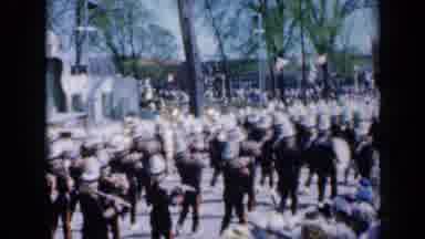 Iowa USA (1959): Music Band Parade In Quiet City Street On Sunny Day