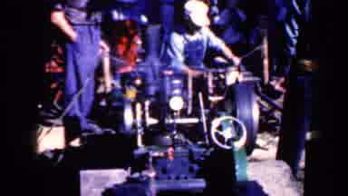 Iowa USA (1959): Workers On The Factory Floor Using High Speed Machines Without