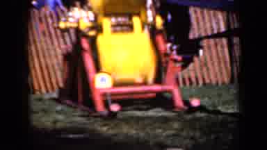 Iowa USA (1959): Machine With Yellow Spinning Apparatus Is Operating In Fenced