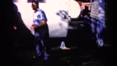 IOWA USA-1959: Men Greeting Friend With Handshake Outside Trailer