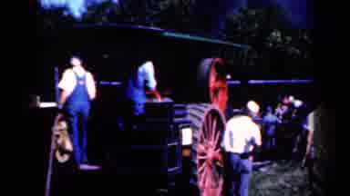 Iowa USA (1959): Work Farm Tractor Tires Mechanical Men Labor Feed Hard Manual