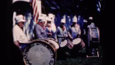 Iowa USA (1959): People In A Lone With Drums And Instruments Playing Them